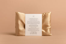 Load image into Gallery viewer, night babe gold silk pillowcase in packaging, back.
